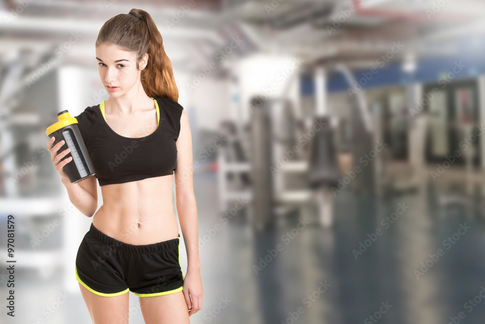 Woman About to Drink a Protein Shake Woman About to Drink a Protein Shake