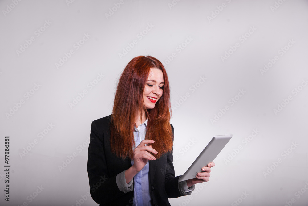 red businesswoman showing tablet isolated over white red businesswoman showing tablet isolated over white