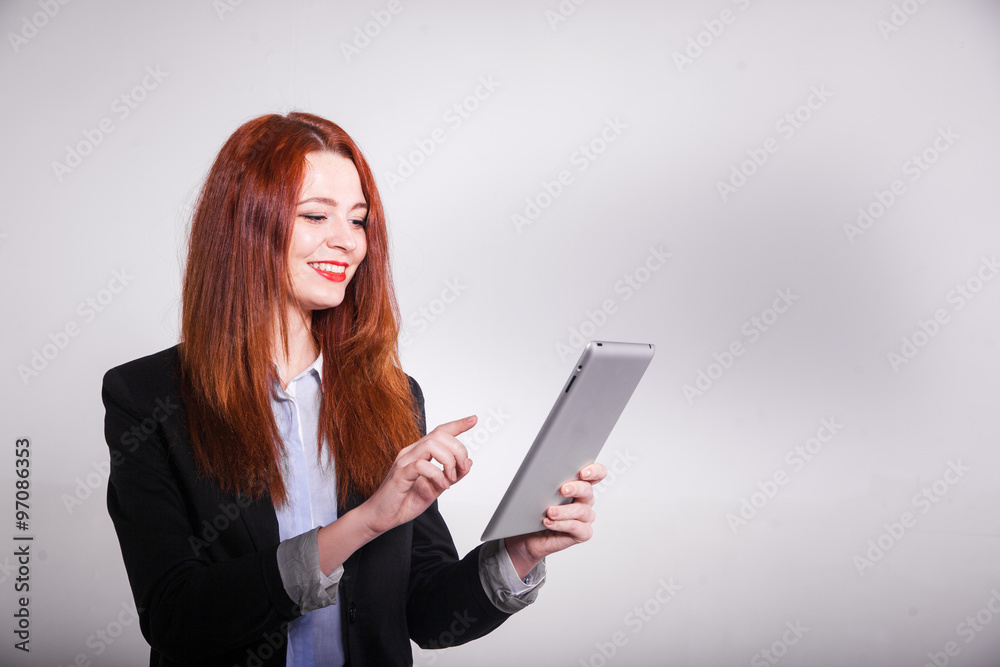 red businesswoman showing tablet isolated over white red businesswoman showing tablet isolated over white