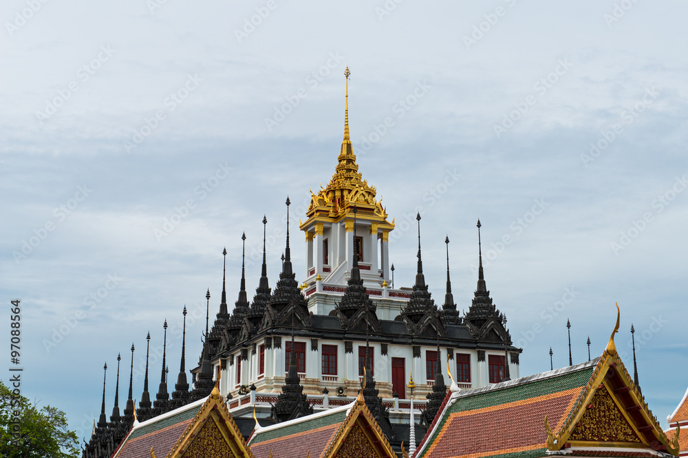 Naklejka premium Loha Prasat 'Metal Castle' in Wat Ratchanaddaram Worawihan at the intersection between Ratchadamnoen Klang and Maha Chai Road, Bangkok Thailand.