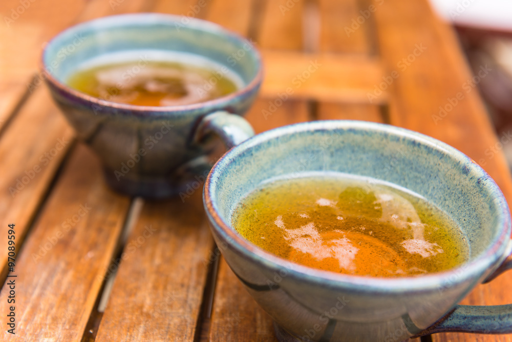 Norman apple cider in a typical ceramic cups Norman apple cider in a typical ceramic cups