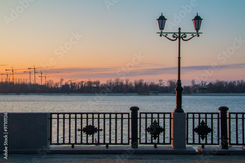 Lanterns on the embankment at dawn