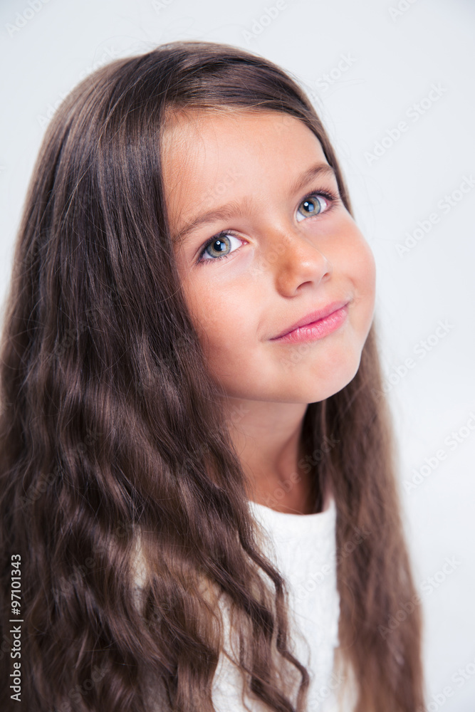 Portrait of a thoughtful little girl looking up Portrait of a thoughtful little girl looking up