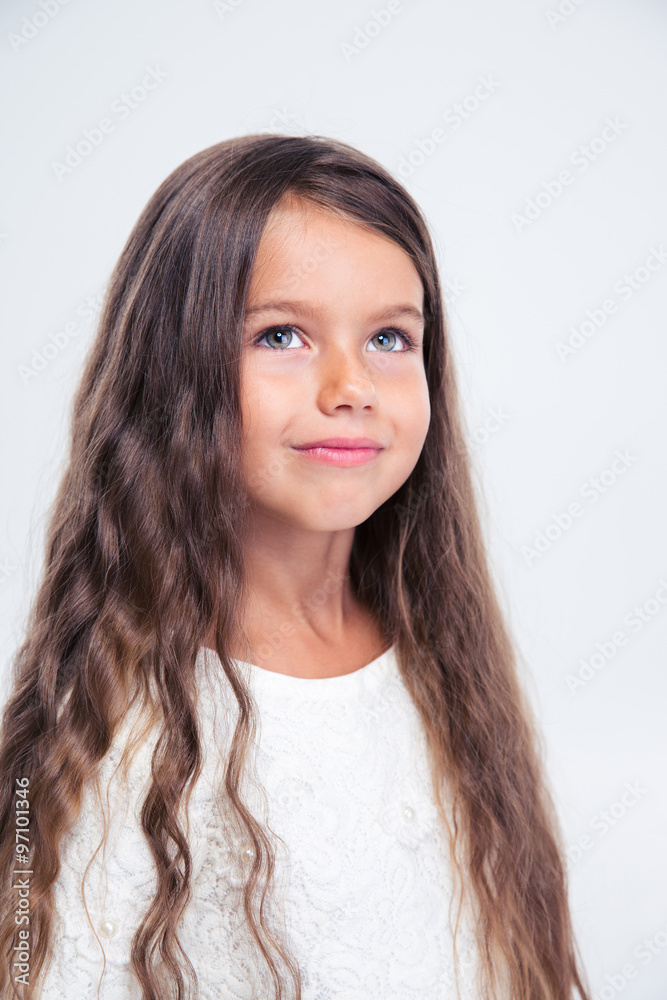 Portrait of a beautiful little girl looking up Portrait of a beautiful little girl looking up