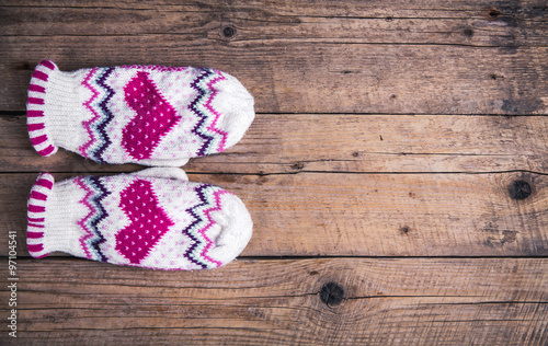 wooden background Classic gloves with cap