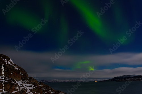 Green aurora over the Arctic Ocean
