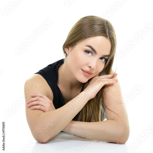 Young beautiful caucasian woman posing against white background.