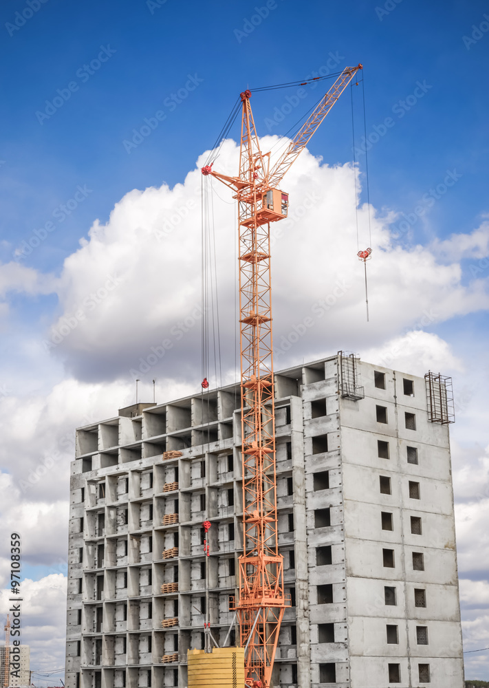 High-rise building and high crane