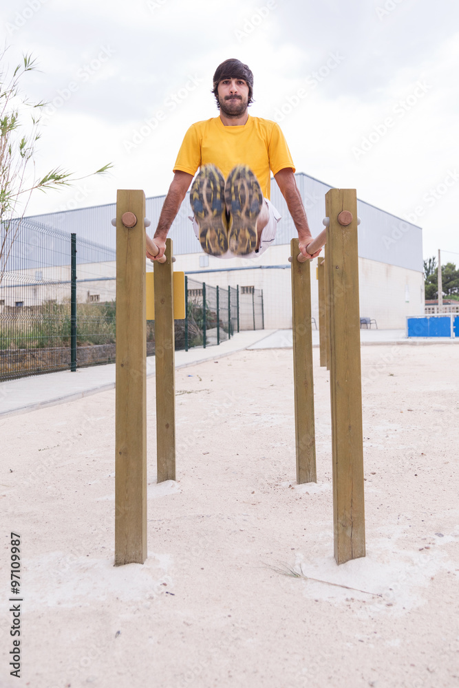 Fototapeta premium man playing sports in parallel