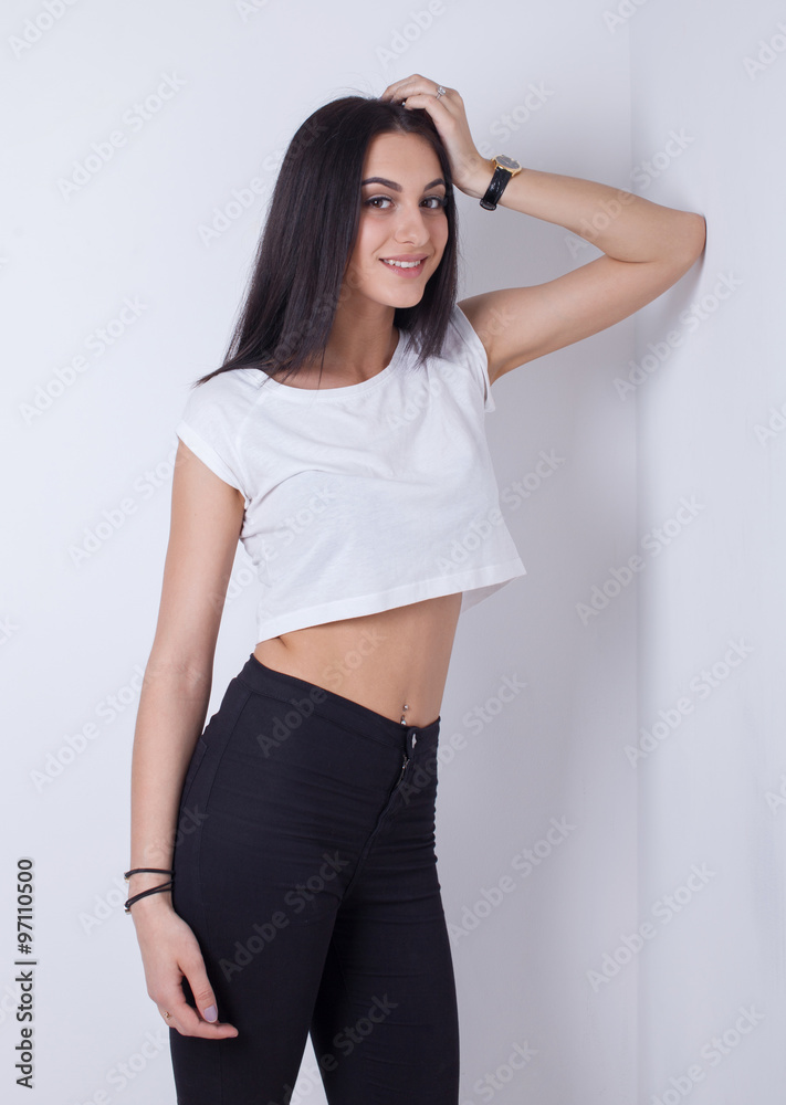 front view of pretty young woman, standing on white background front view of pretty young woman, standing on white background