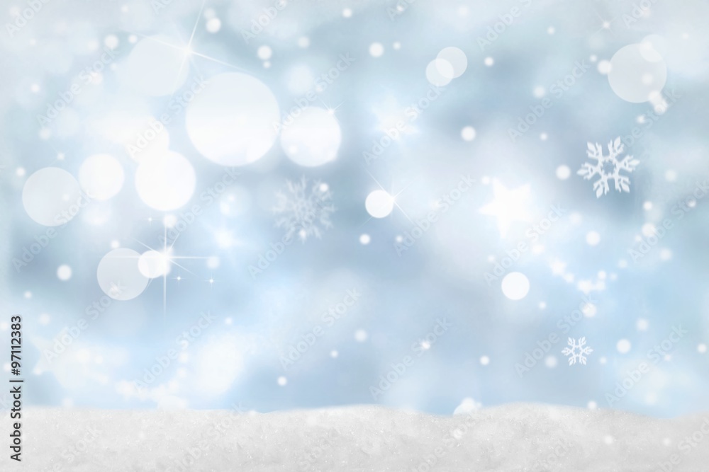 Weihnachtlicher Bokeh-Hintergrund in blau-weiß Farben mit Schnee