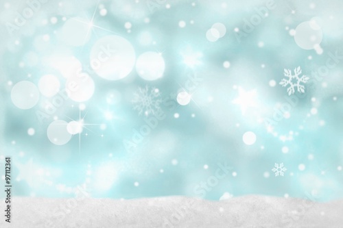 Weihnachtlicher Bokeh-Hintergrund in blau-weiß Farben mit Schnee © Picture-Design