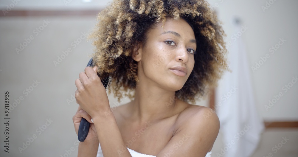 Woman Fixing Hair In The Morning Woman Fixing Hair In The Morning