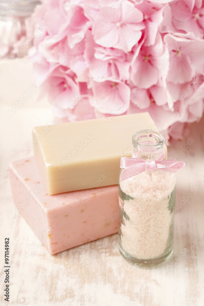 Bottle of sea salt and two bars of handmade soap. Hortensia flow Bottle of sea salt and two bars of handmade soap. Hortensia flow