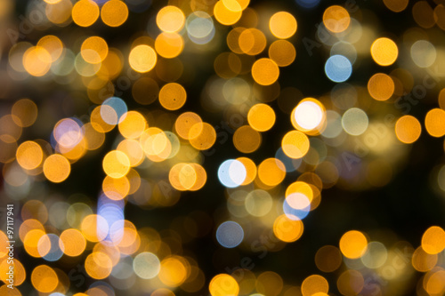 yellow, dark and red background with christmas lights in boken