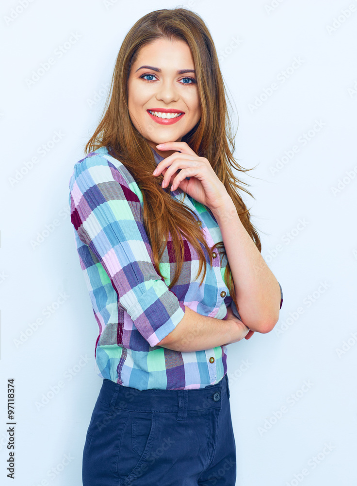 Casual style wear woman portrait against white wall. Casual style wear woman portrait against white wall.