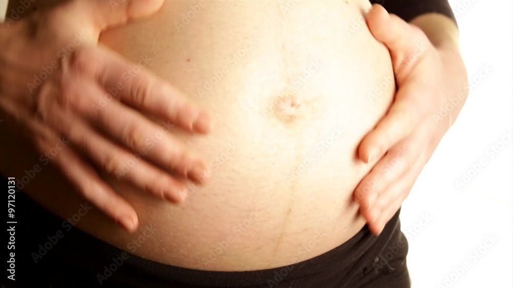 mother mommy caressing own big tummy belly arms tender isolated white background mother mommy caressing own big tummy belly arms tender isolated white background