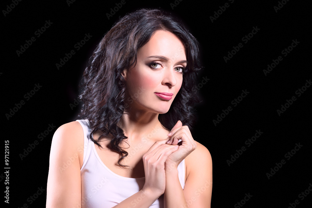 Beautiful brunette woman with curly hair and evening make up Beautiful brunette woman with curly hair and evening make up