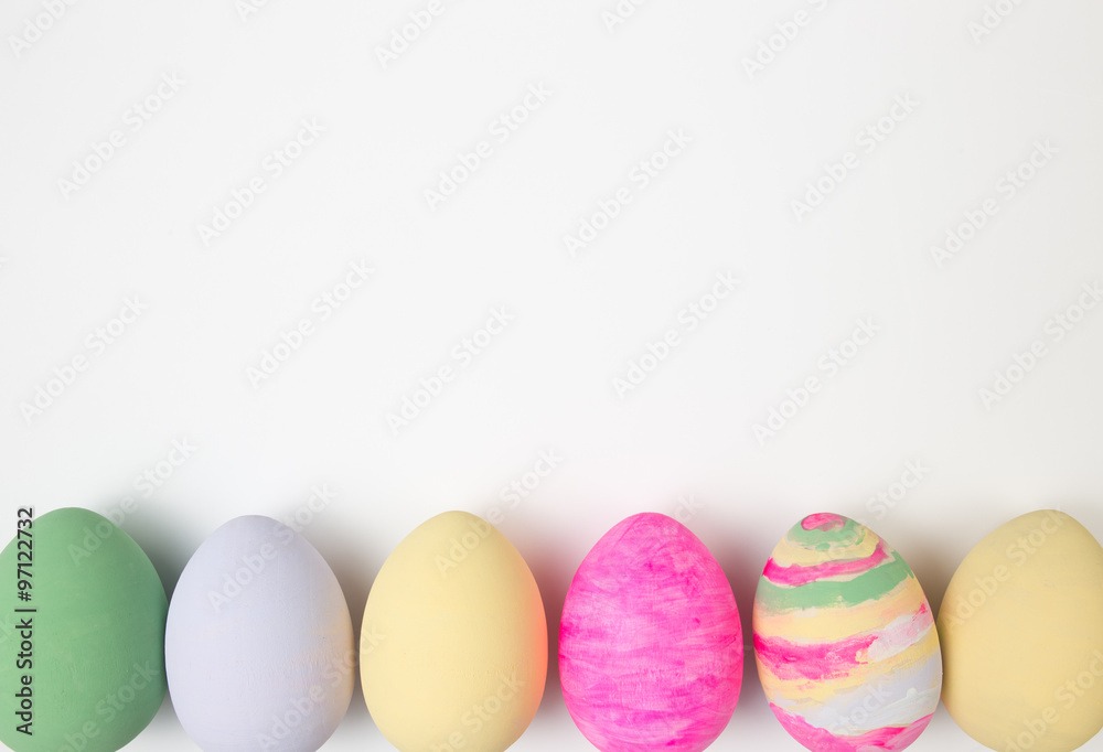 Easter eggs painted in pastel colors on a white background Easter eggs painted in pastel colors on a white background