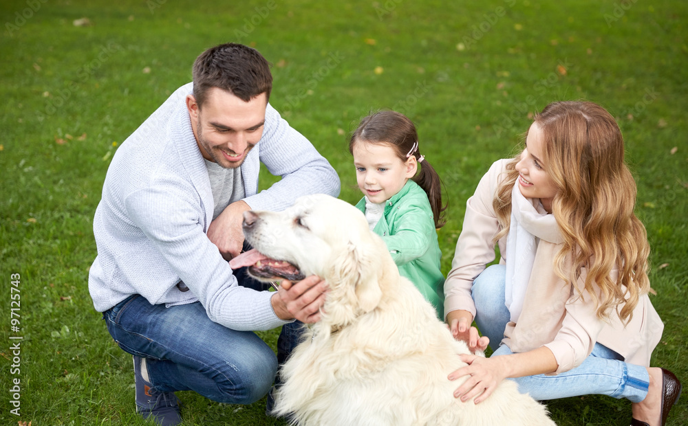 happy family with labrador retriever dog in park happy family with labrador retriever dog in park