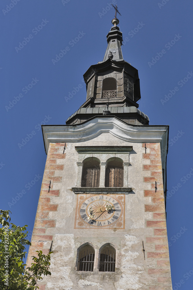 Church Assumption of Mary bell tower on lake Bled island