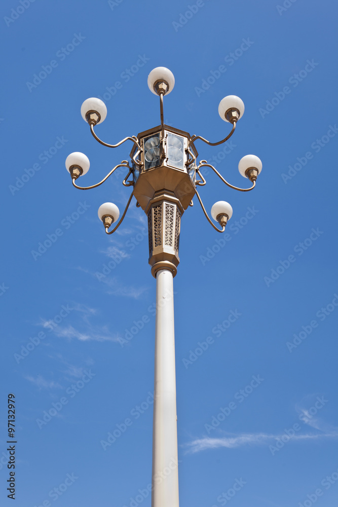 Ornate lantern against a blue sky at Tiananmen, Beijing, China Ornate lantern against a blue sky at Tiananmen, Beijing, China