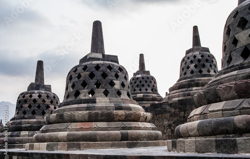 Stone stupa Borobudur temple. Indonesia. The island of Java. An excellent illustration.