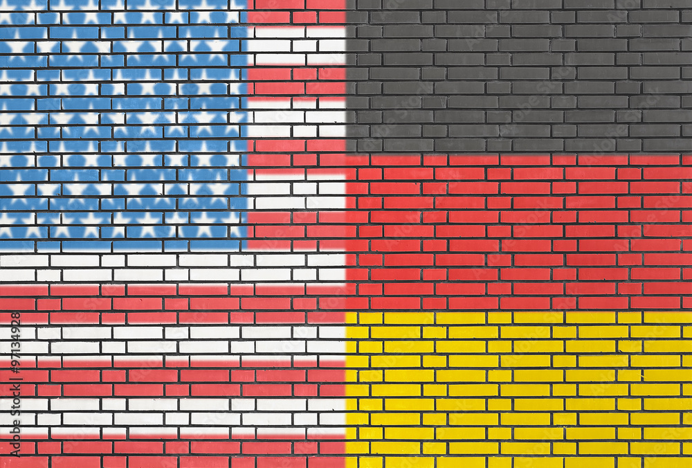 USA and Germany flags on a wall