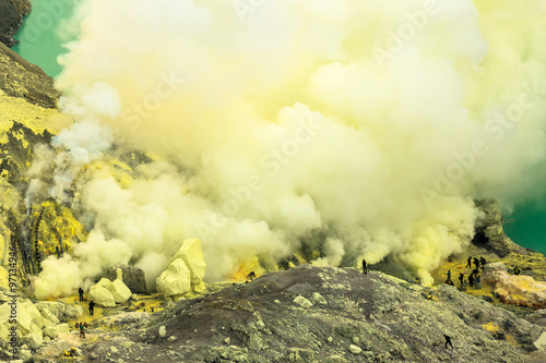 Kawah Ijen volcanic crater lake and toxic sulfur fume,Indonesia