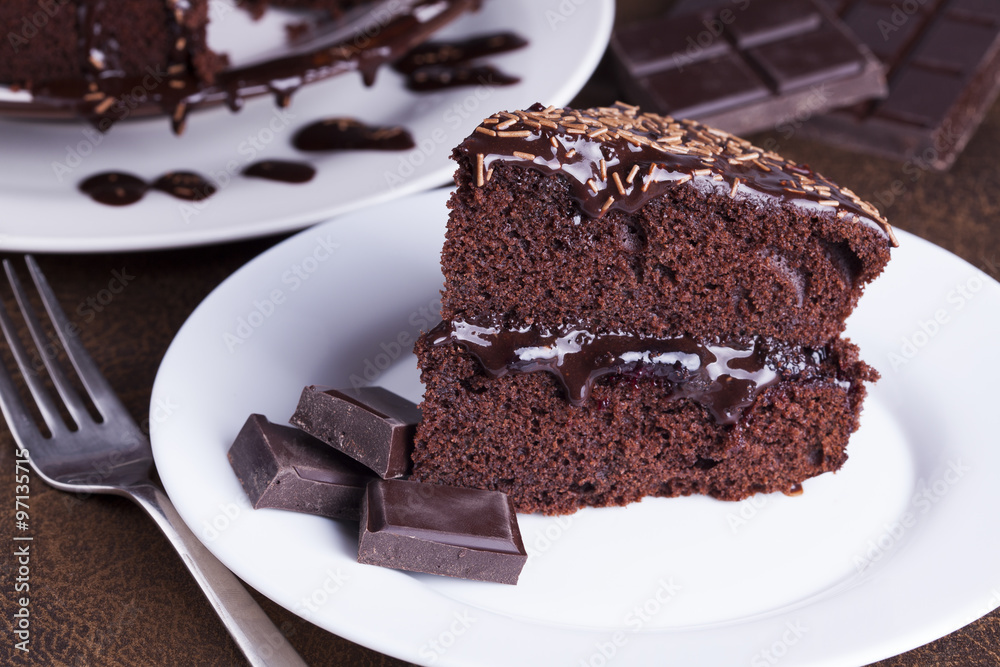 Luxurious Rich Chocolate Cake on White Plate Luxurious Rich Chocolate Cake on White Plate