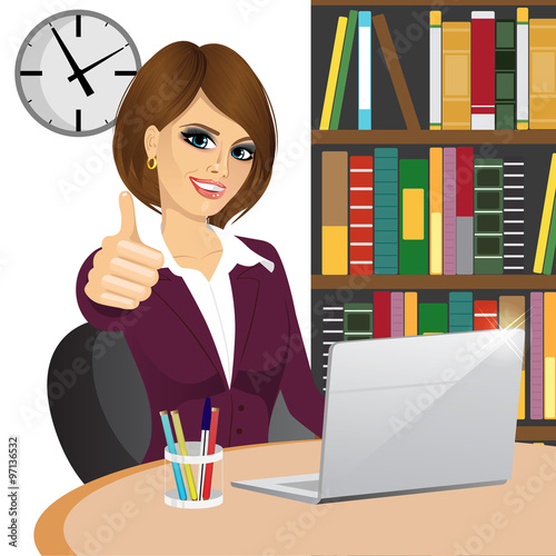 businesswoman making thumbs up gesture