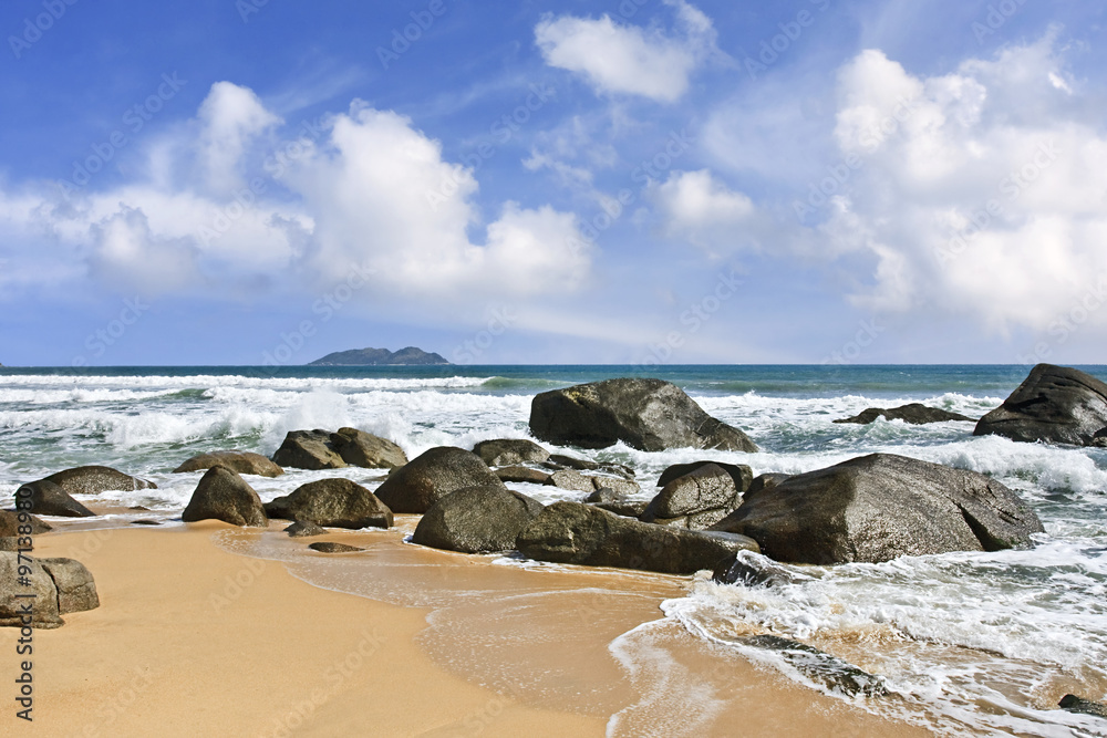 Rock formation in the surf of Sanya, Hainan Island, China