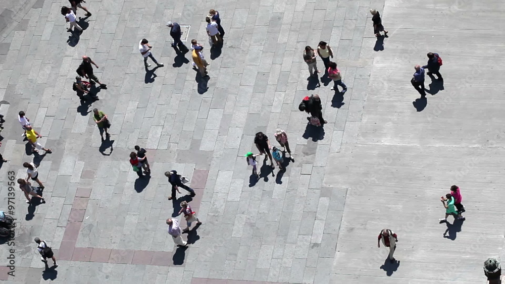 People walking on plaza in pedestrian zone - aerial top view