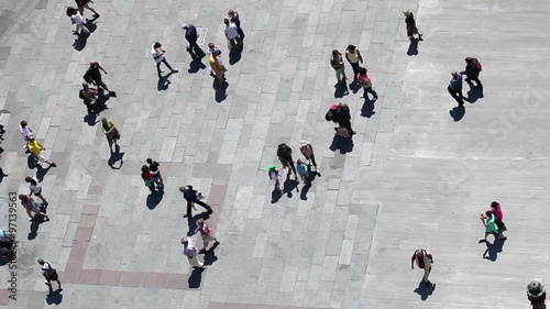 People walking on plaza in pedestrian zone - aerial top view