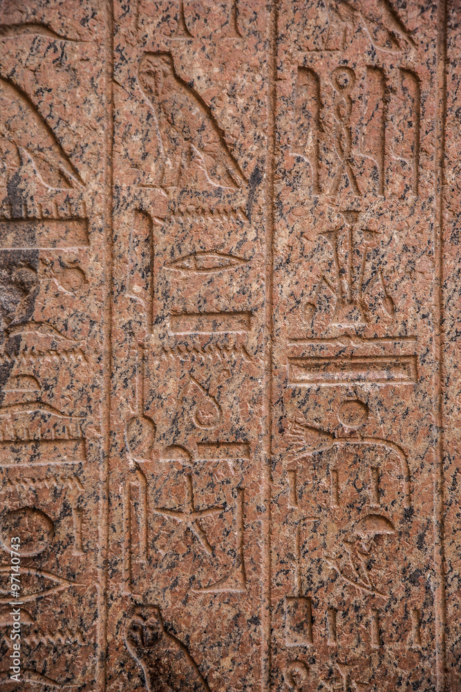 old egypt hieroglyphs carved on the stone