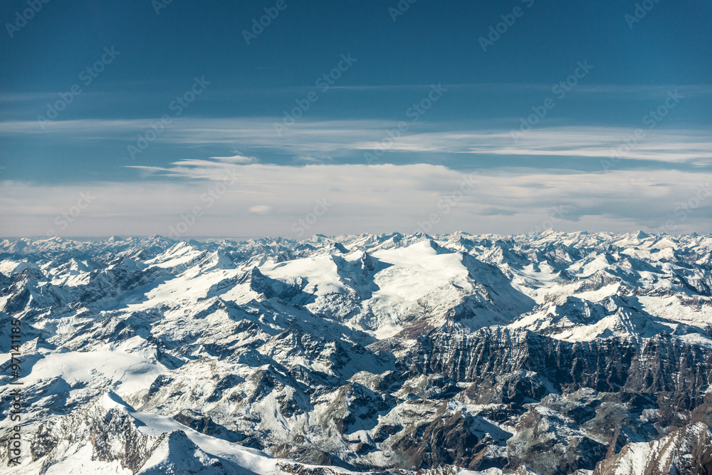 aerial view to snowy mountain peaks in austria tyrol