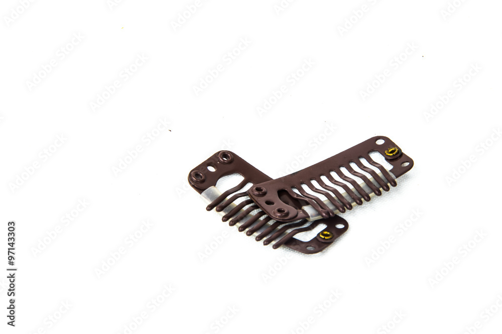 Clip in extension clips - brown. White background Clip in extension clips - brown. White background