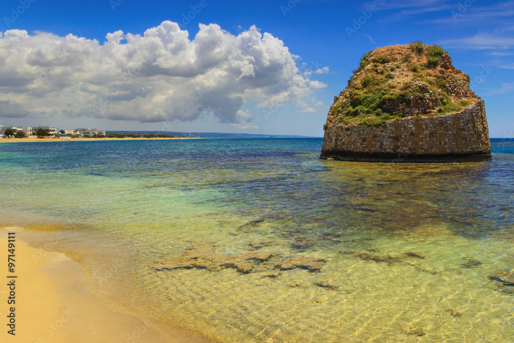 SUMMER Salento coast: Torre Pali beach (Lecce). ITALY (Apulia).The low sandy coastline is charactherized by dunes covered with Mediterranean scrub.Its name comes from the sixteenth-century watchtower. SUMMER Salento coast: Torre Pali beach (Lecce). ITALY (Apulia).The low sandy coastline is charactherized by dunes covered with Mediterranean scrub.Its name comes from the sixteenth-century watchtower.