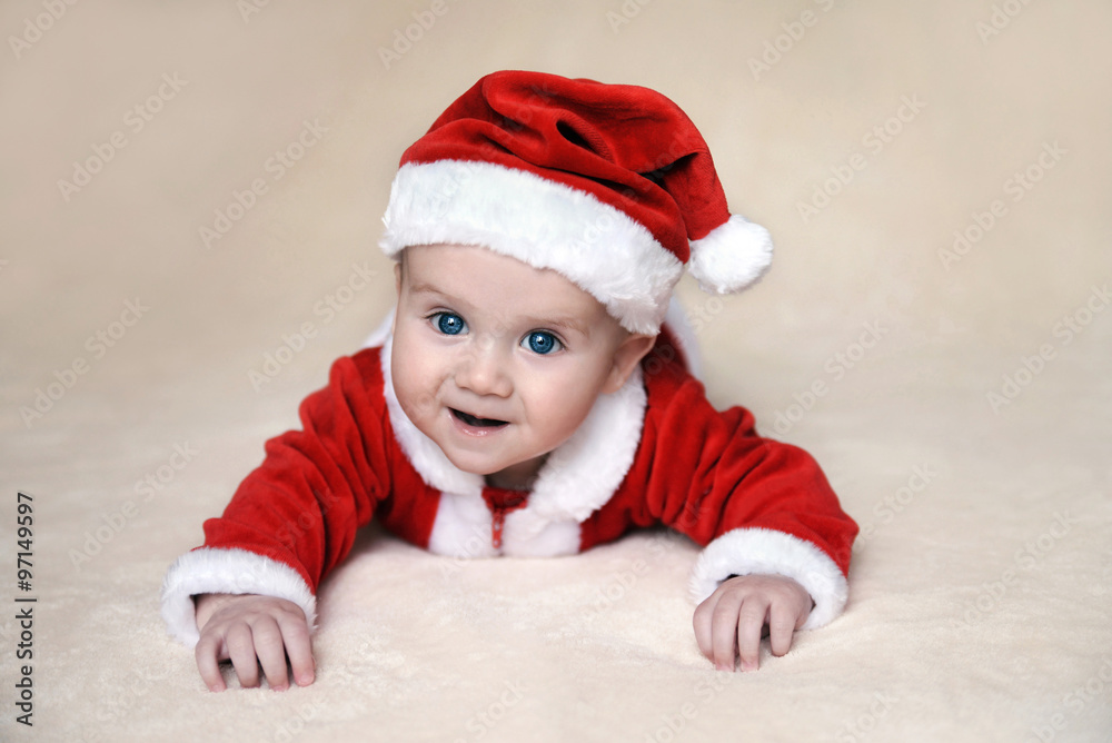 Baby wearing christmas costume of Santa Baby wearing christmas costume of Santa