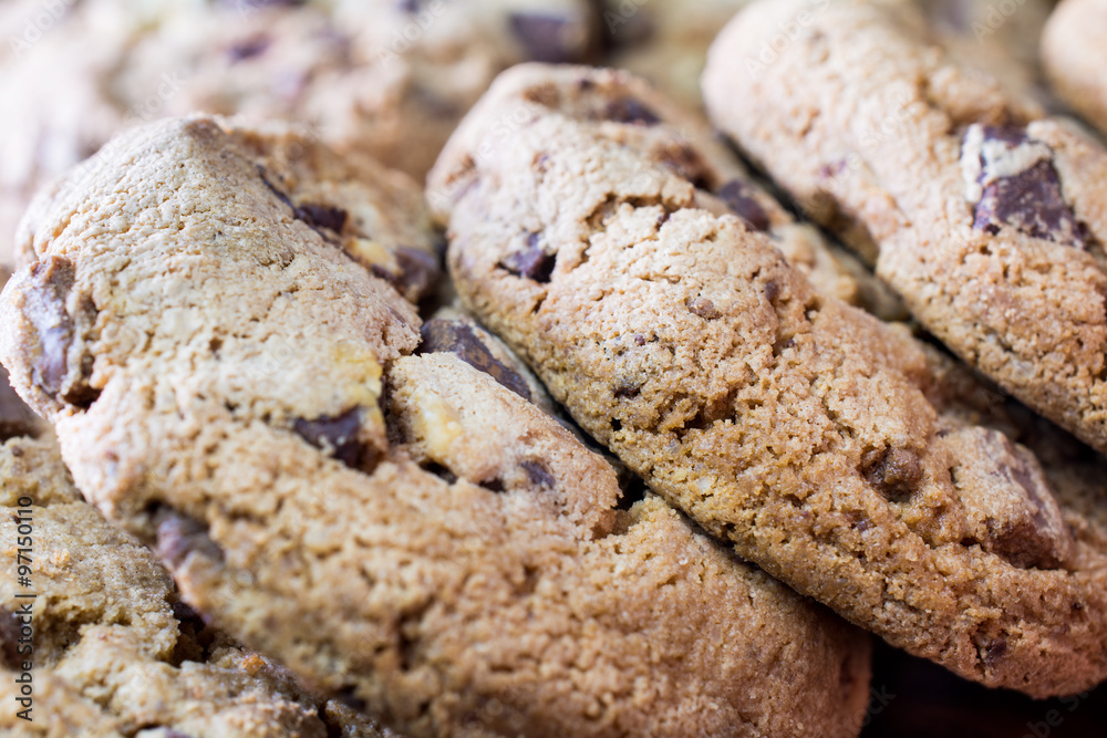 Close Up Of A Lying Pile Of Baked Cookies With Triple Chocolate, In Front Of Other Biscuits Close Up Of A Lying Pile Of Baked Cookies With Triple Chocolate, In Front Of Other Biscuits