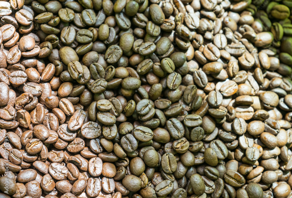 Naklejka premium Coffee beans in the roasting machine
