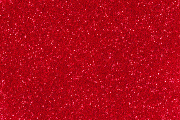 Red glitter texture christmas background.