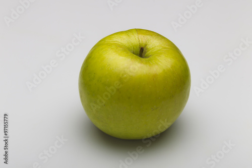 Green apple on a white background