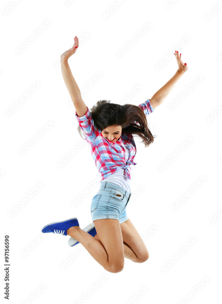 Active girl jumping in joy, isolated on white