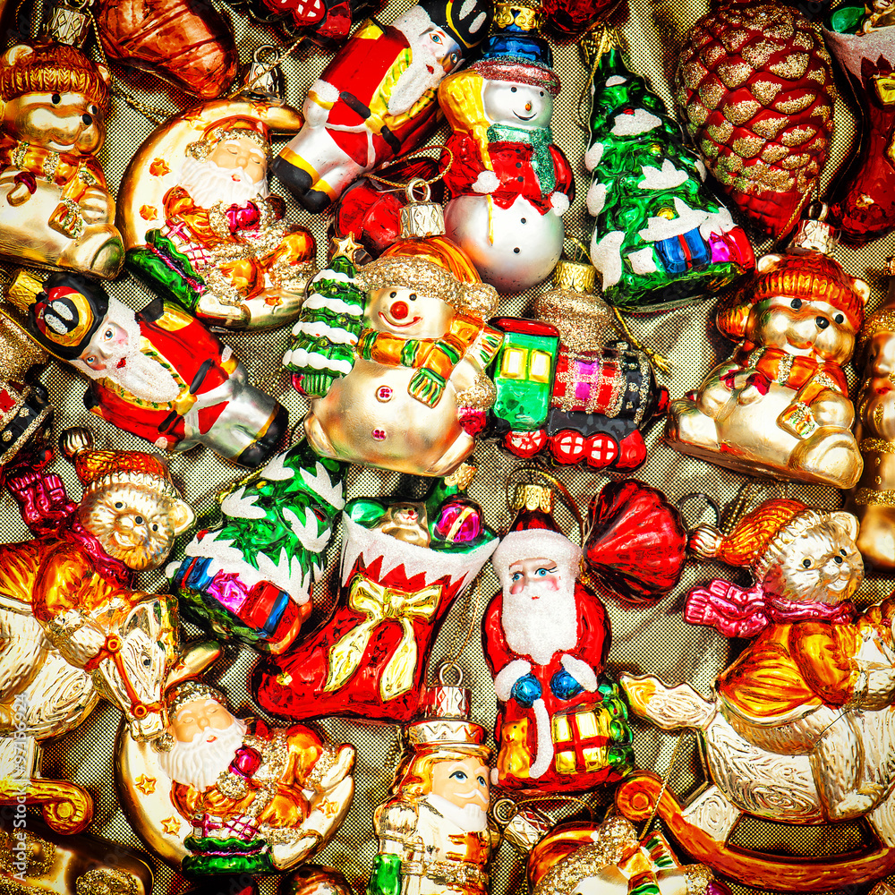 Christmas tree decorations baubles, toys and ornaments. Vibrant