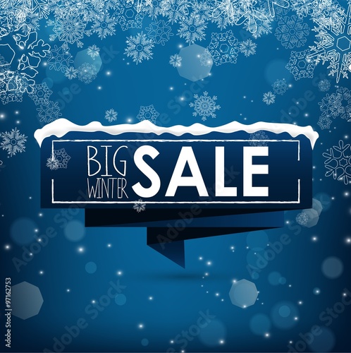 Big winter sale banner over blue background with snow and snowflakes