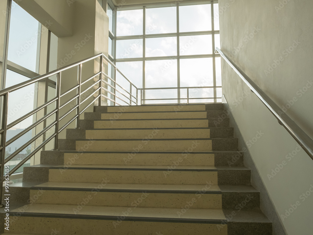 Cream stairs with window and sky destination Cream stairs with window and sky destination