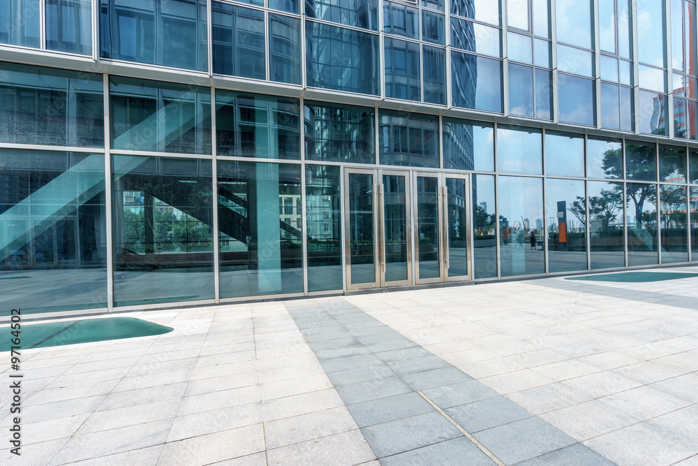 empty ground and exterior of modern buildings