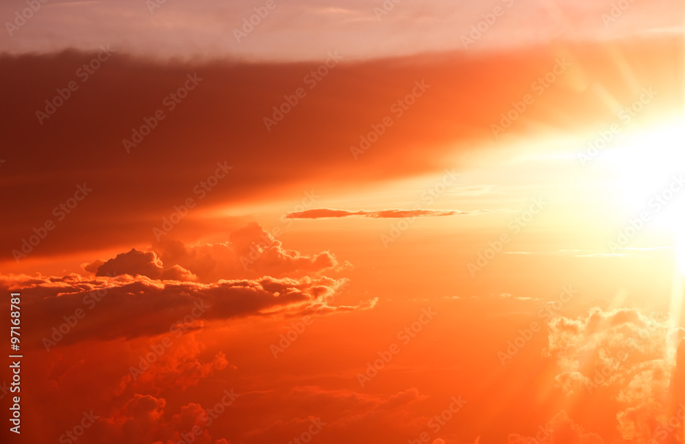 Fototapeta premium Amazing view from plane on sunrise sun and clouds