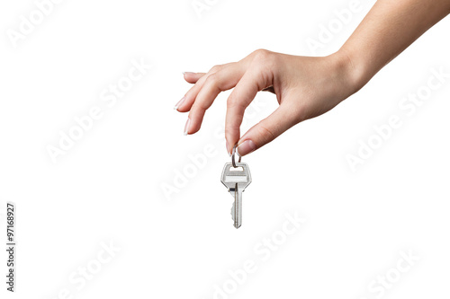 Beautiful woman hand with a key 